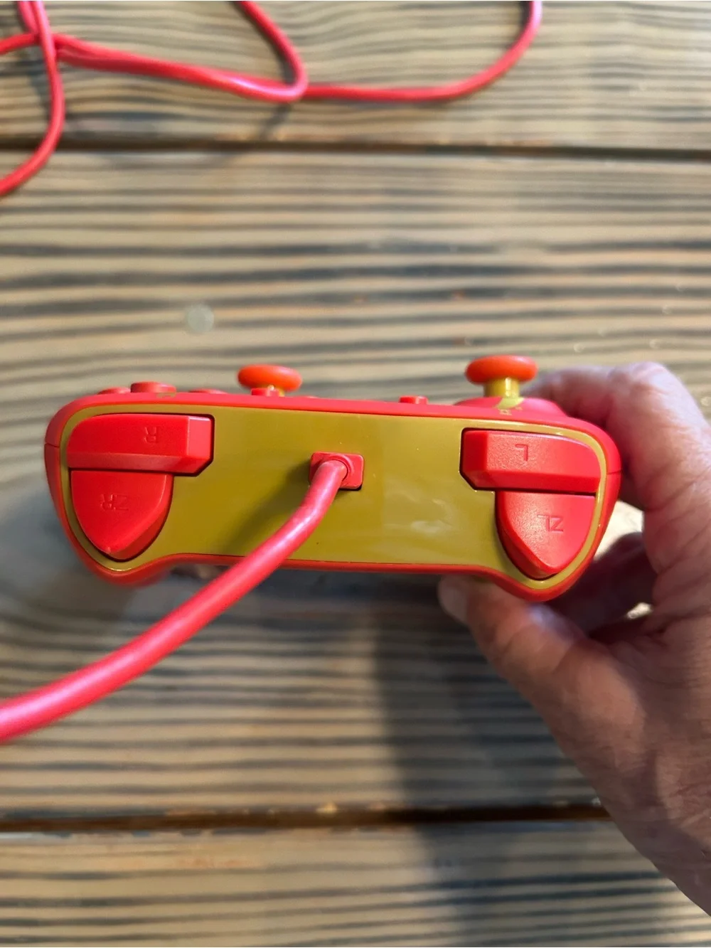 Red and Gold Wired Gaming Controller with Icon Accents